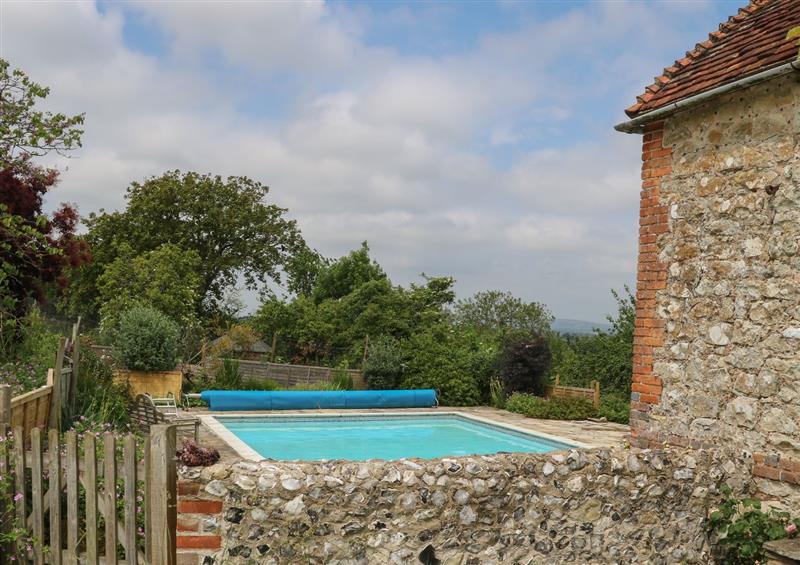 There is a swimming pool at Byre Cottage 1, Sullington near Storrington