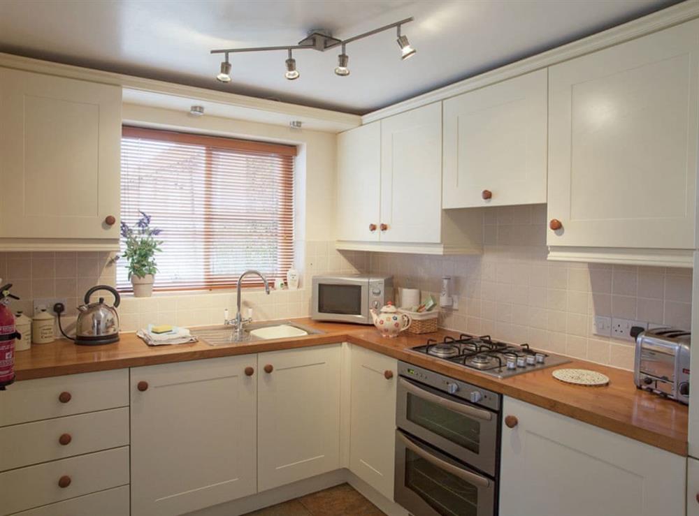 Well-equipped fitted kitchen at Byre Cottage in Hutton-le-Hole, near Kirkbymoorside, North Yorkshire
