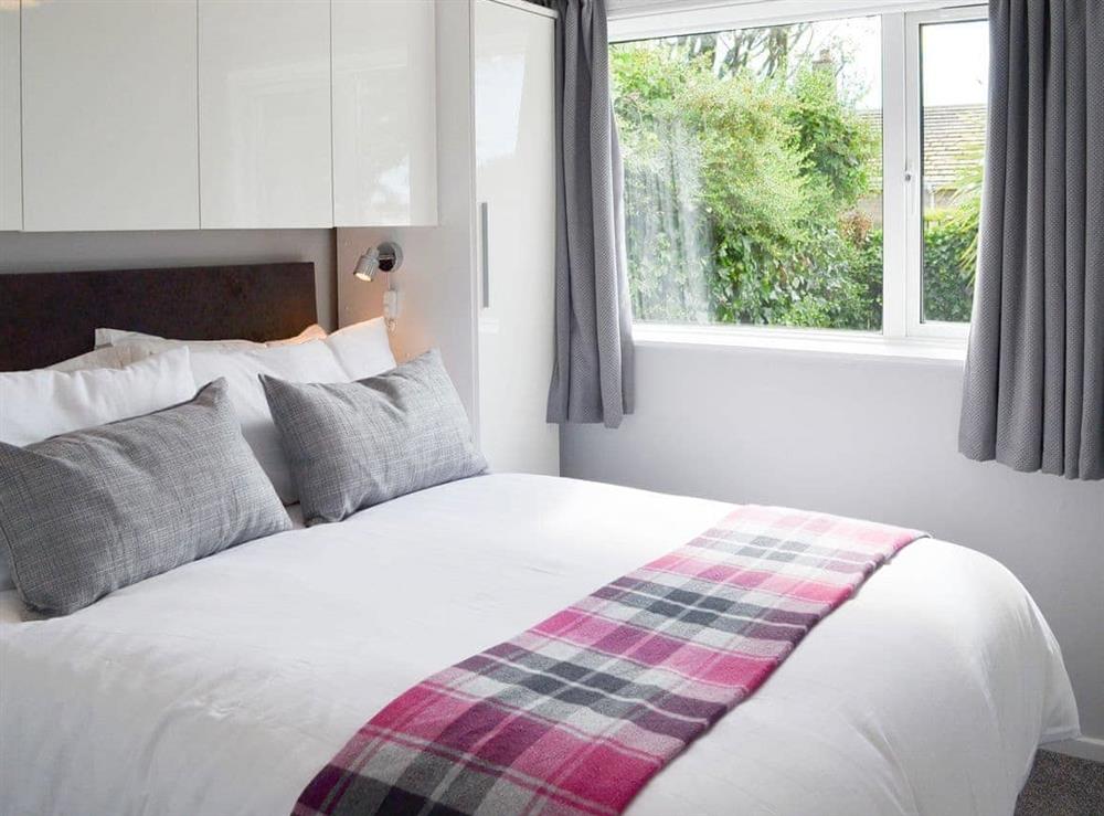 Comfortable and inviting double bedroom at Cabbage Tree Cottage in Beadnell, near Alnwick, Northumberland