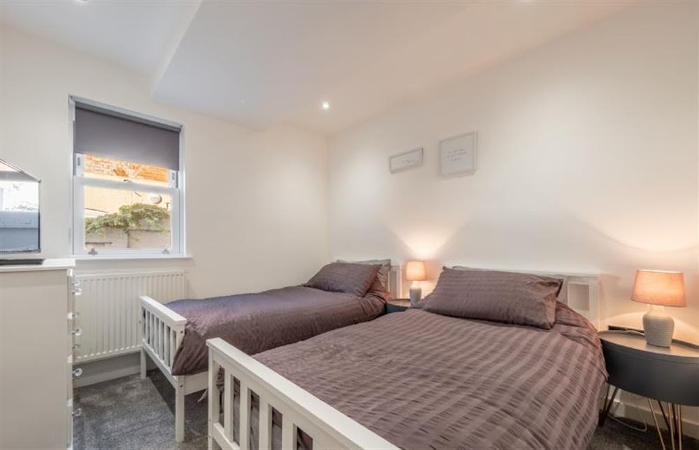 Ground floor: Bedroom two with twin 3ft single beds at Cabbell Courtyard, Cromer