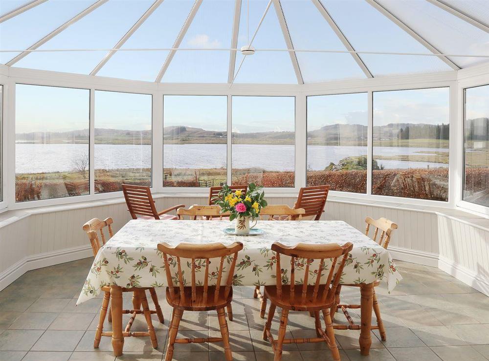 Beautiful conservatory with a magnificent view at Caddleton Farmhouse in Ardmaddy Castle, Nr Oban, Argyll., Great Britain