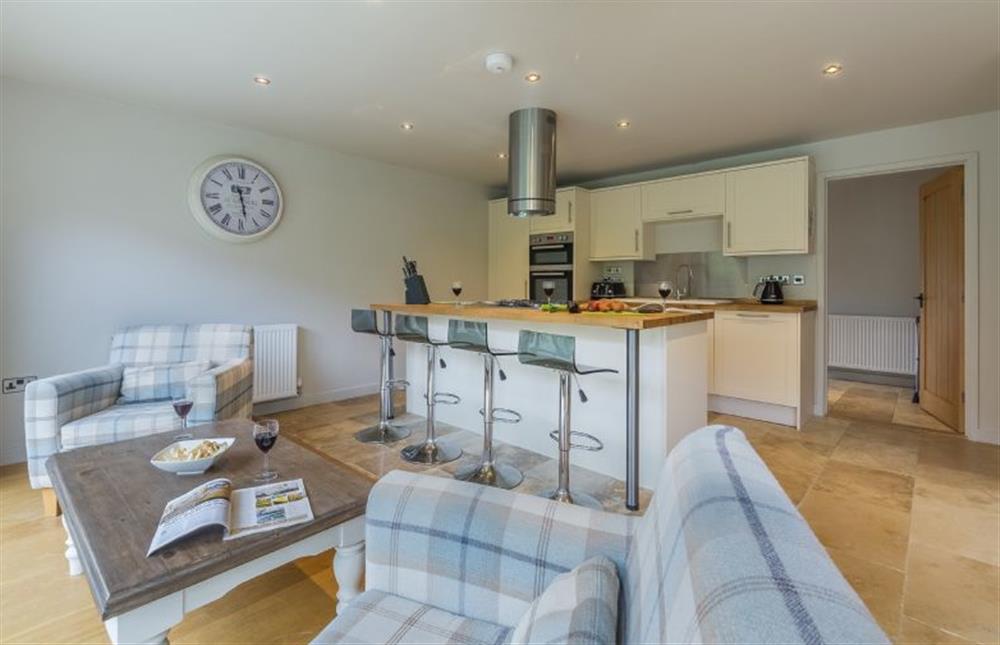 Ground floor: Kitchen with island and bar stools at Caddows, Docking near Kings Lynn