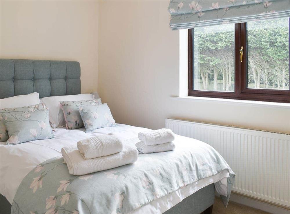 Double bedroom (photo 2) at Cae Coch in Brynteg, near Benllech, Anglesey, Gwynedd