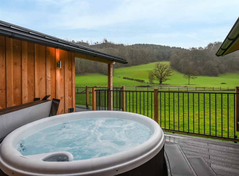 Hot tub at Cae Glas Lodge in Welshpool, Powys