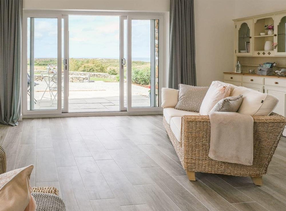 Light and airy living area with wonderful sea views at Pant y Saer, 