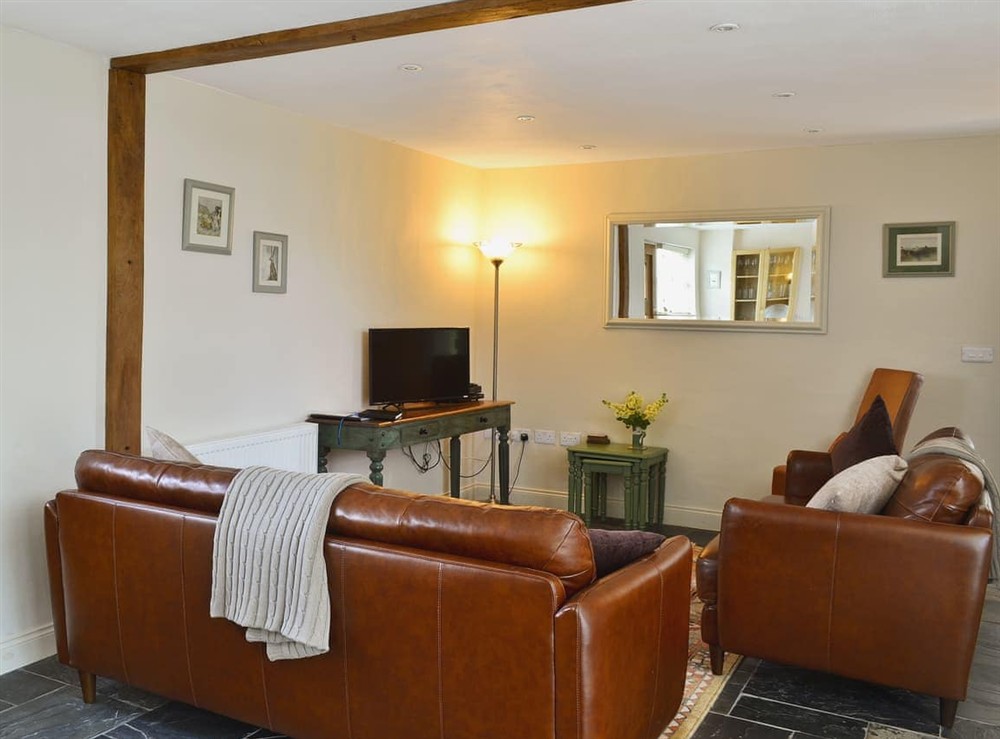 Living room at Caeley Barn in Penybont, near Llandrindod Wells, Powys