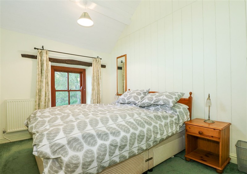This is a bedroom at Caen Y Coed Cottage, Penrhyndeudraeth