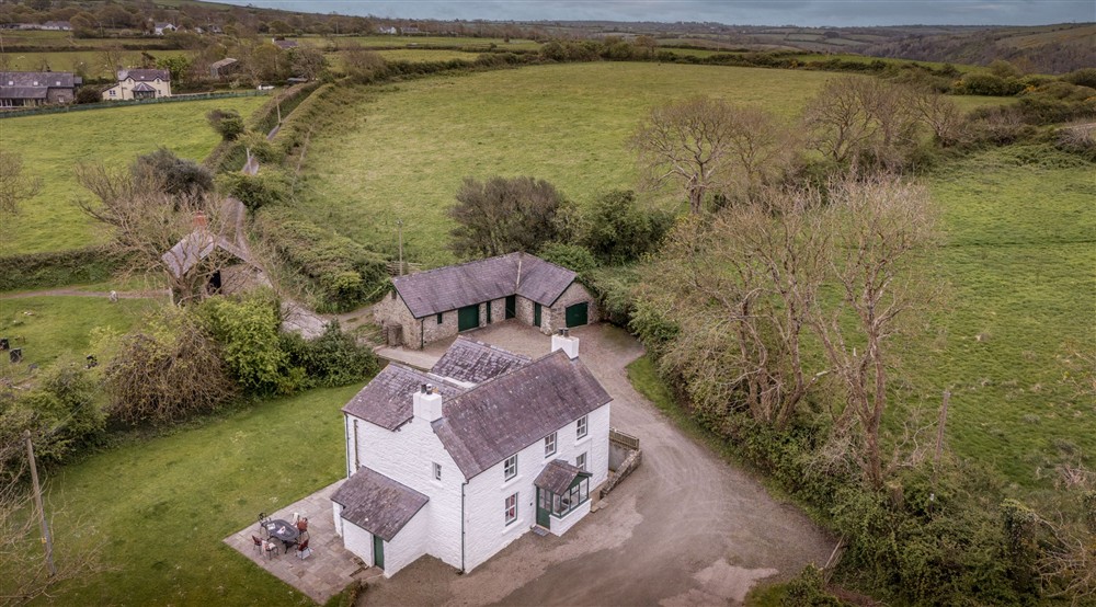 An aerial view of Caerllan and the surrounding farmland, Ceredigion at Caerllan in Llandysul, Ceredigion