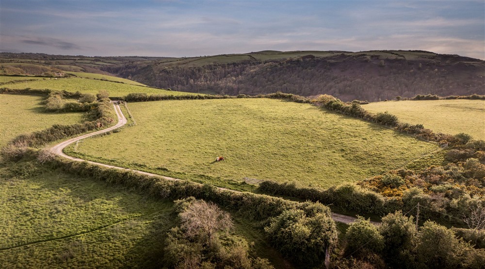 An aerial view of the fields and countryside around Caerllan, Ceredigion at Caerllan in Llandysul, Ceredigion