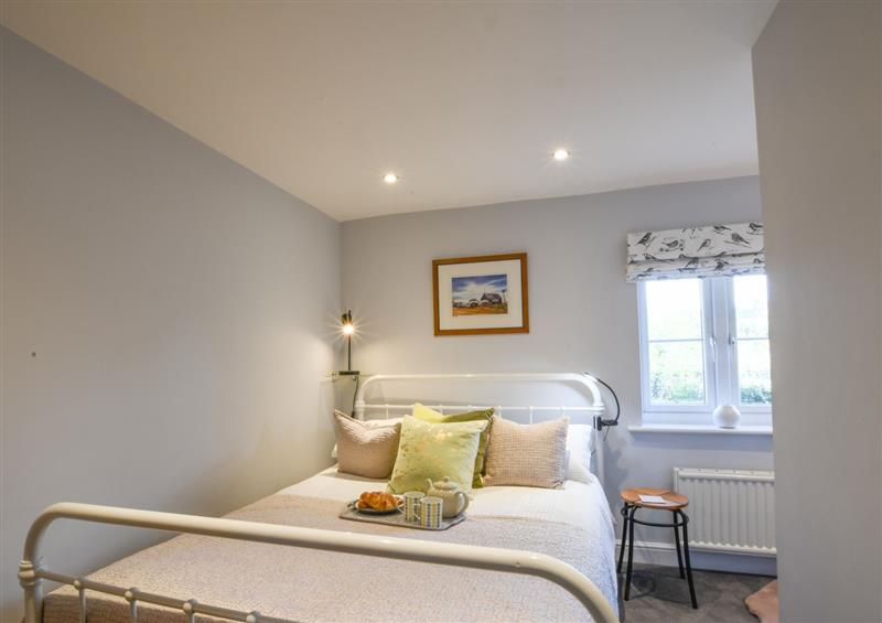 One of the bedrooms at Caines Cottage, Westleton, Westleton