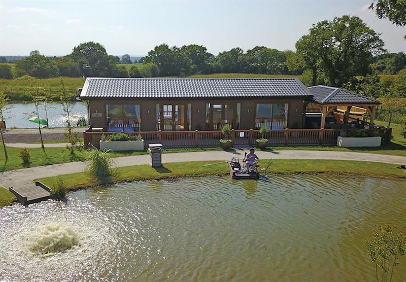 Teal Lodge and setting at Caistor Lakes Lodges in Caistor, Market Rasen