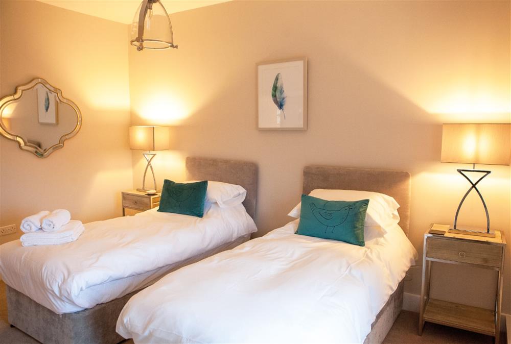 Bunny bedroom with twin 3’ single beds at Calcot Farmhouse, Montgomery