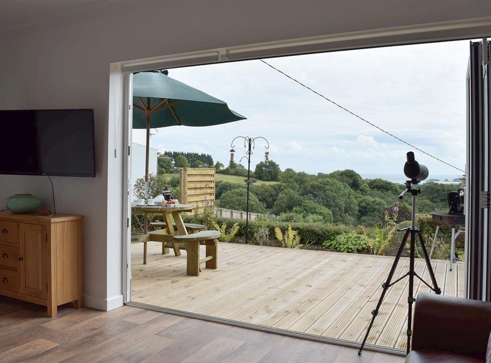 Bi-folding doors leading to the decking area at Caldey View in Near Stepaside, Saundersfoot, Pembrokeshire, Dyfed