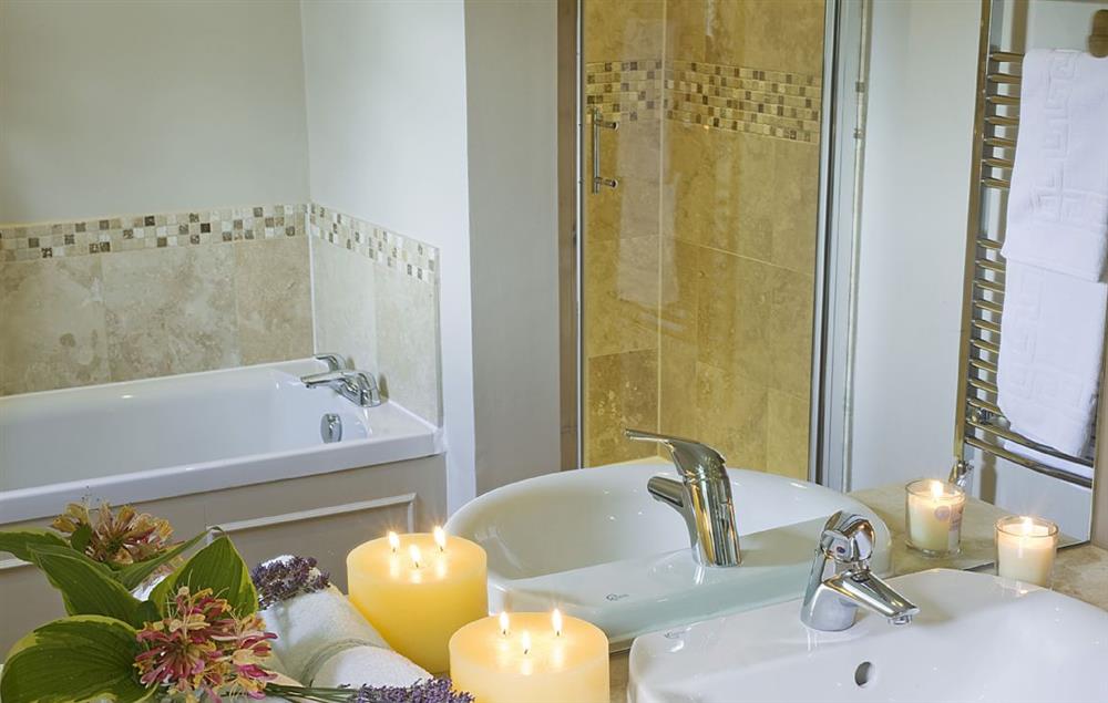 Family bathroom with separate bath and shower at Callander Cottage, Whitchurch