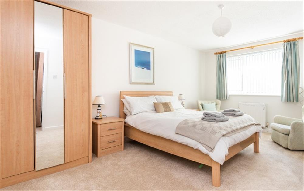 Downstairs double bedroom with en suite shower at Calleva in Lyme Regis