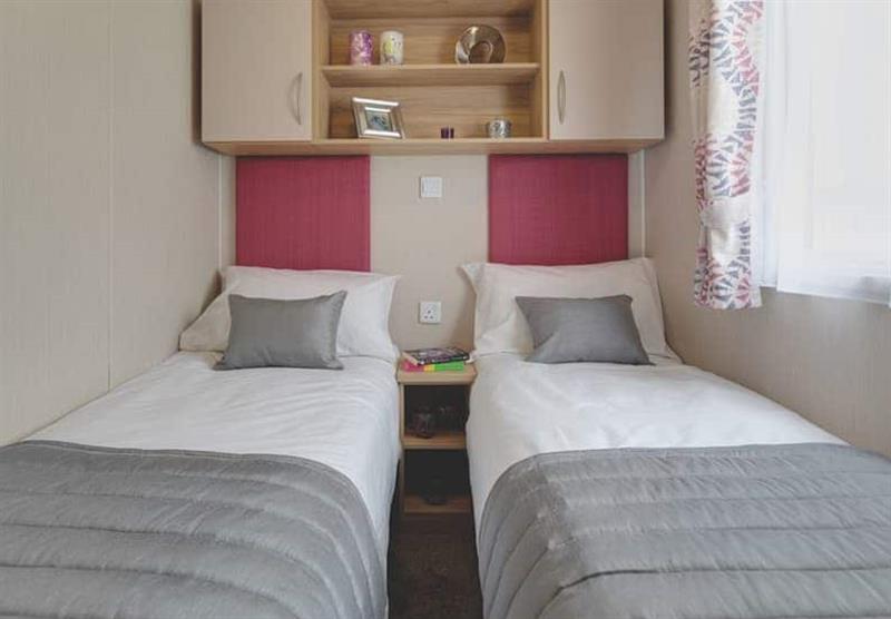 Twin bedroom in a Whitsand 2 at Calloose Holiday Park in Leedstown, Cornwall
