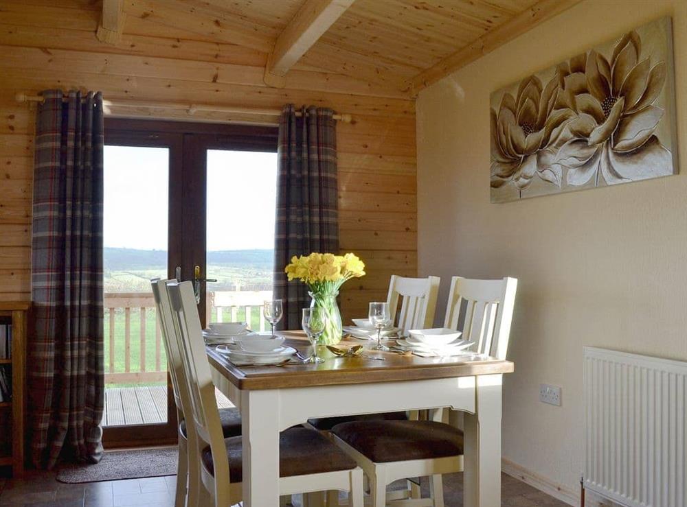 Lovely dining area with views to the surrounding countryside at Callow Lodge in Bromlow, near Minsterley, Shropshire