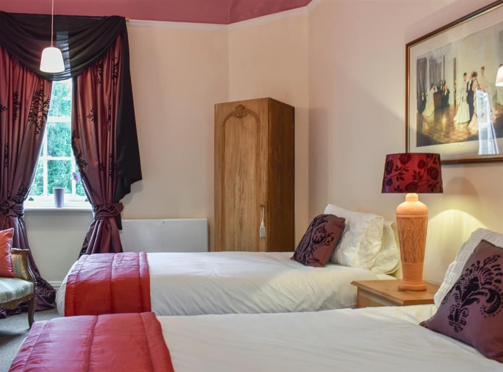Twin bedroom at Calthwaite Hall West Wing in Calthwaite, near Penrith, Cumbria