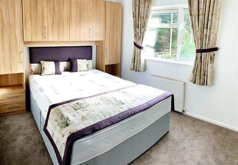 Double bedroom in a lodge at Calvine Holiday Park in Pitlochry, Southern Highlands