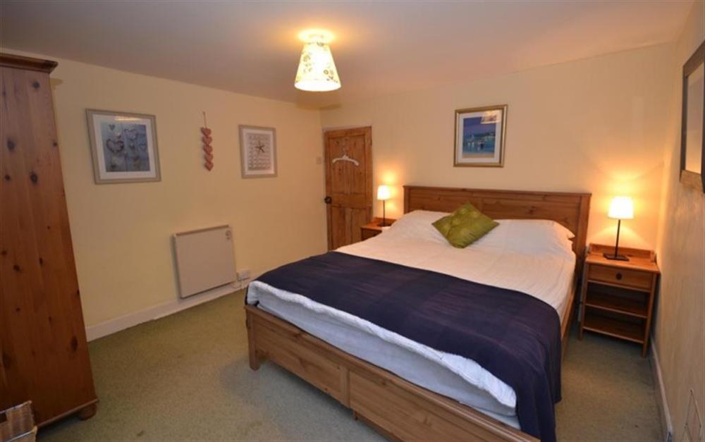 One of the double bedrooms with king size bed at Camac Cottage in Hope Cove