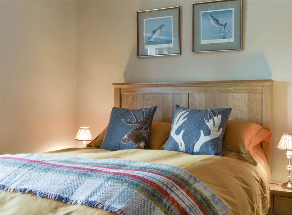 Relaxing double bedroom at Caman House, Apartment 2 in Newtonmore, Inverness-Shire