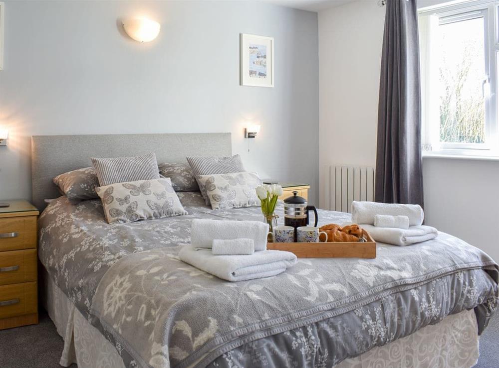 Comfortable double bedroom at Camelia Cottage in Polmassick, near St Austell, Cornwall, England