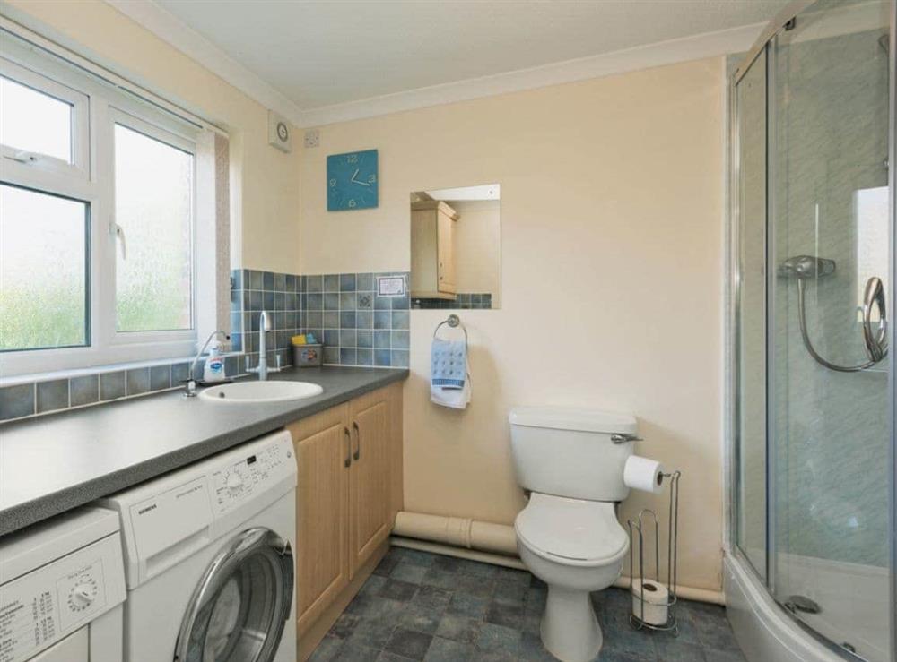Utility with separate shower cubicle at Camelot in Weybourne, near Holt, Norfolk., Great Britain