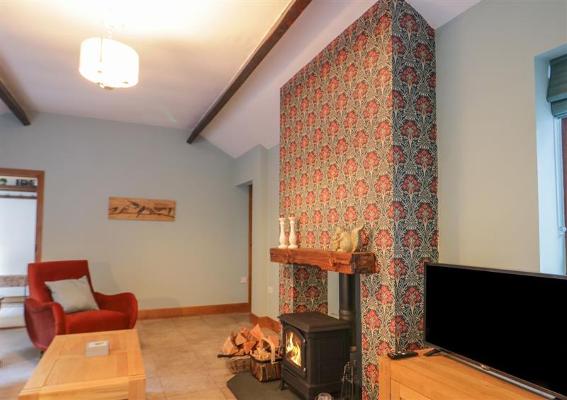 Enjoy the living room at Camerton Hall Cottage, Cockermouth