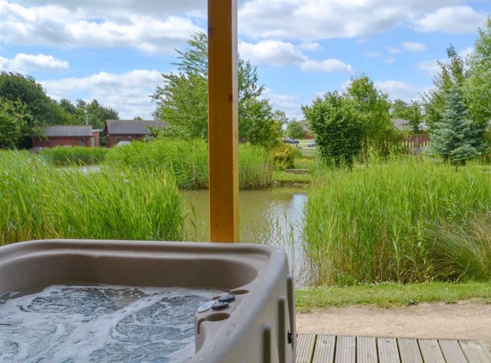 Relaxing hot tub with lovely views at Campbell Lodge in Thorpe on the Hill, near Lincoln, Lincolnshire, England