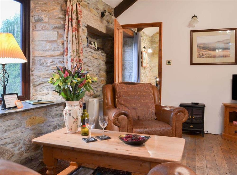 Lovely living area with wooden floors at Campion Cottage in Michaelstow, Nr Camelford, Cornwall., Great Britain