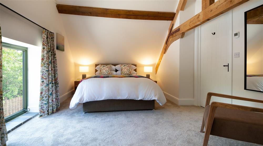 The king sized bedroom at Canal Barn in Shrewsbury, Shropshire