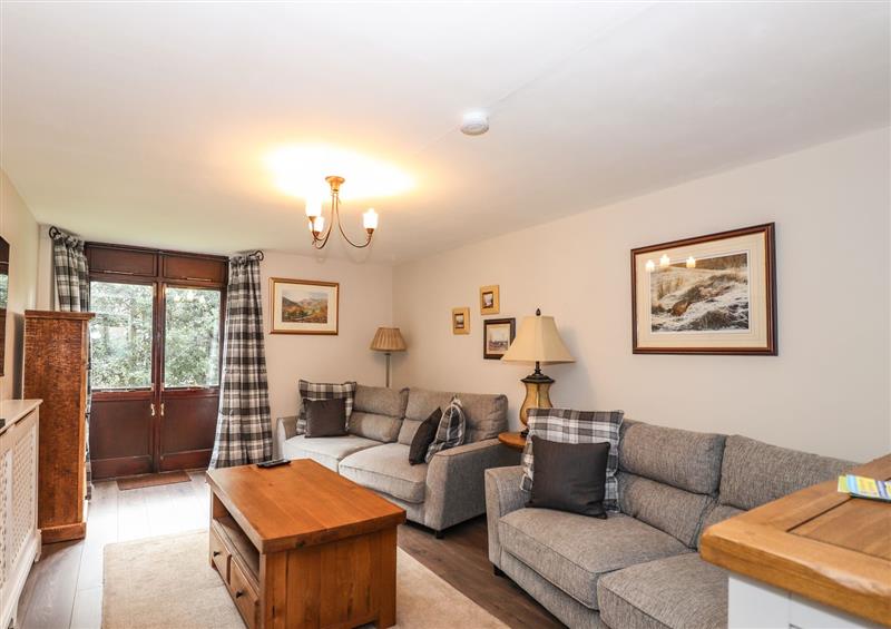 Relax in the living area at Candleberry Cottage, Ambleside