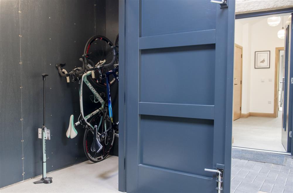 Secure bike storage with electric charging points