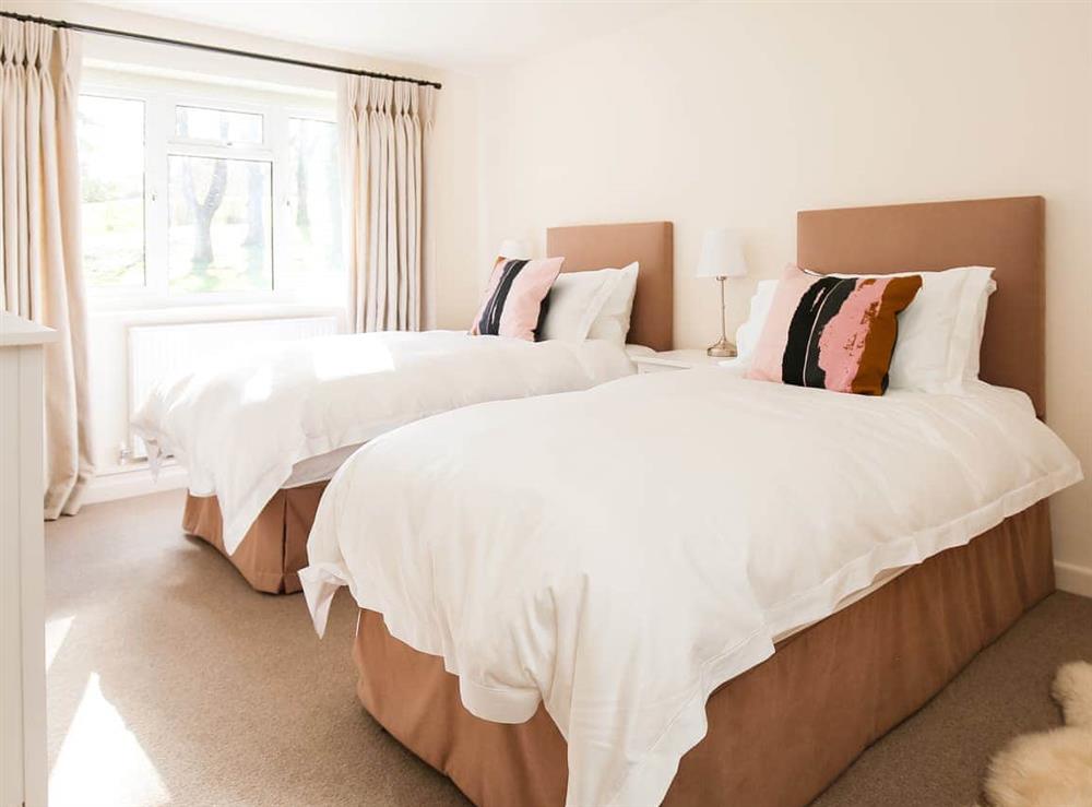 Twin bedroom at Canonteign Cottage in Christow, Devon