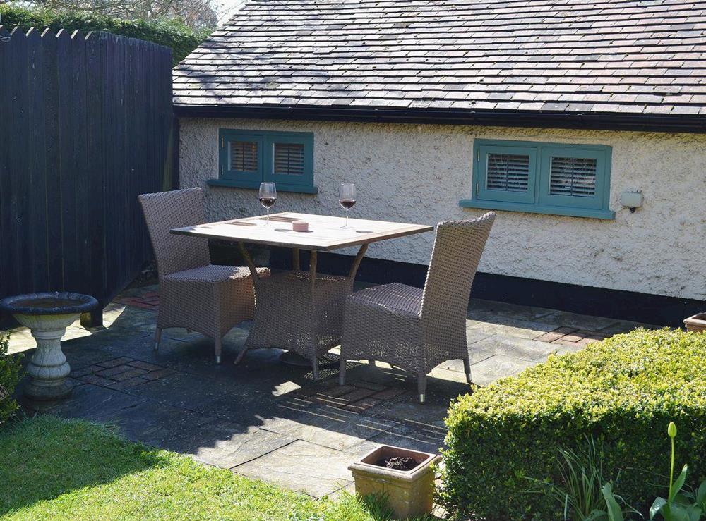 A private and secluded sitting out area to the rear of the property at The Gardeners Cottage, 