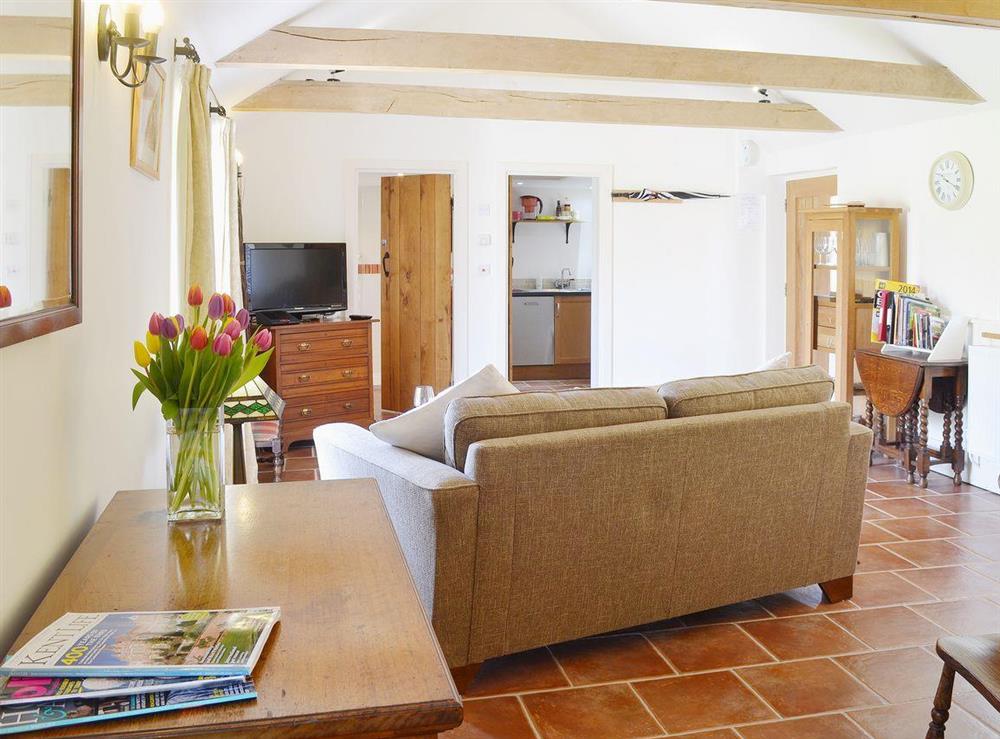 Comfortable furnishings and contemporary decor sit alongside period features at The Stables, 