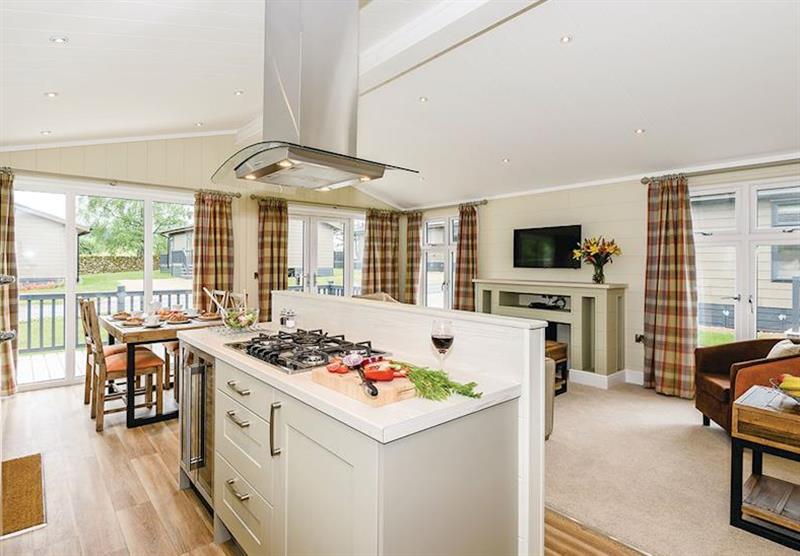 Kitchen and dining area at Canterbury Reach Lodge Retreat in Canterbury, Kent