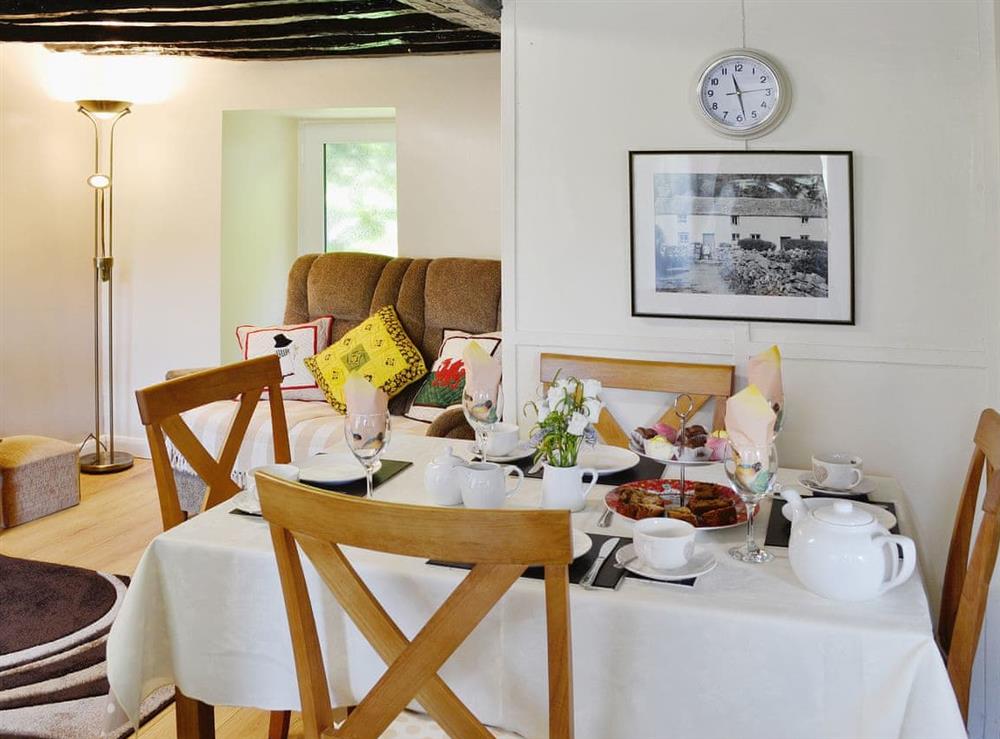 Cosy dining area for up to four people at Capel Fawnog Bach in Talsarnau, Gwynedd