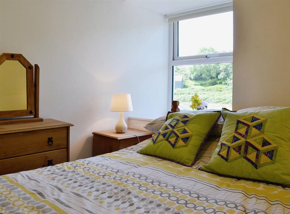 The comfortable double bedroom at Capel Fawnog Bach in Talsarnau, Gwynedd