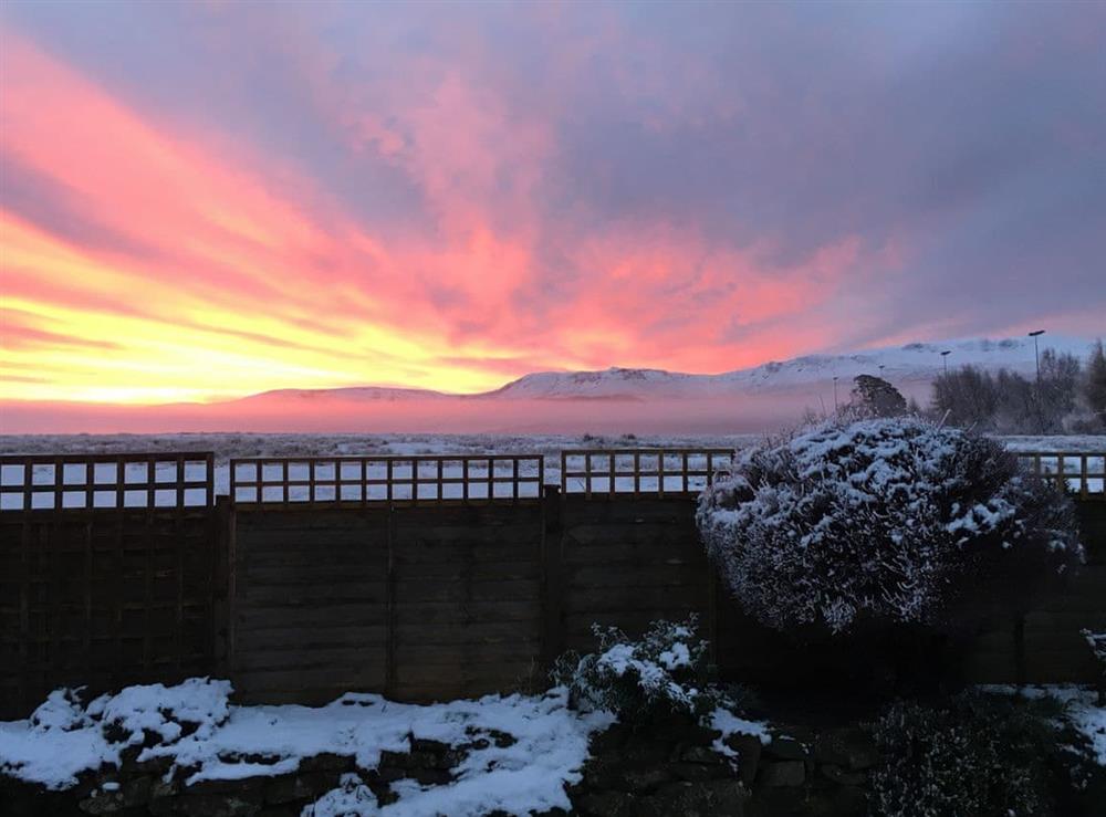Winter sunset view from the garden at Capelrig Cottage in Glasgow, Lanarkshire