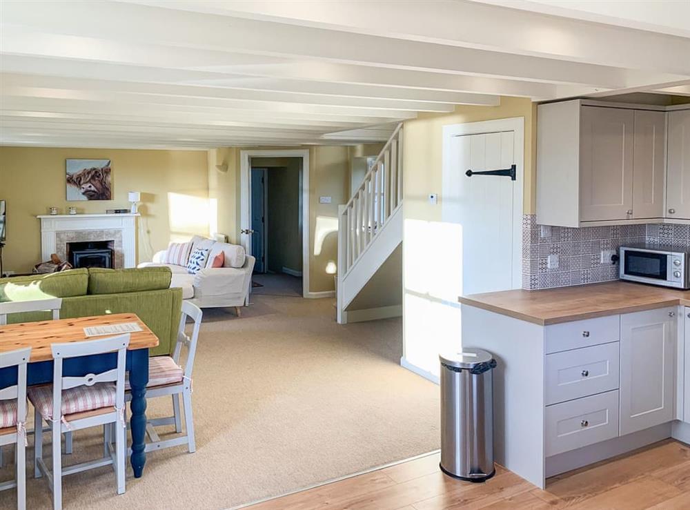 Open plan living space at Capricorn Cottage in Rockcliffe, Cumbria