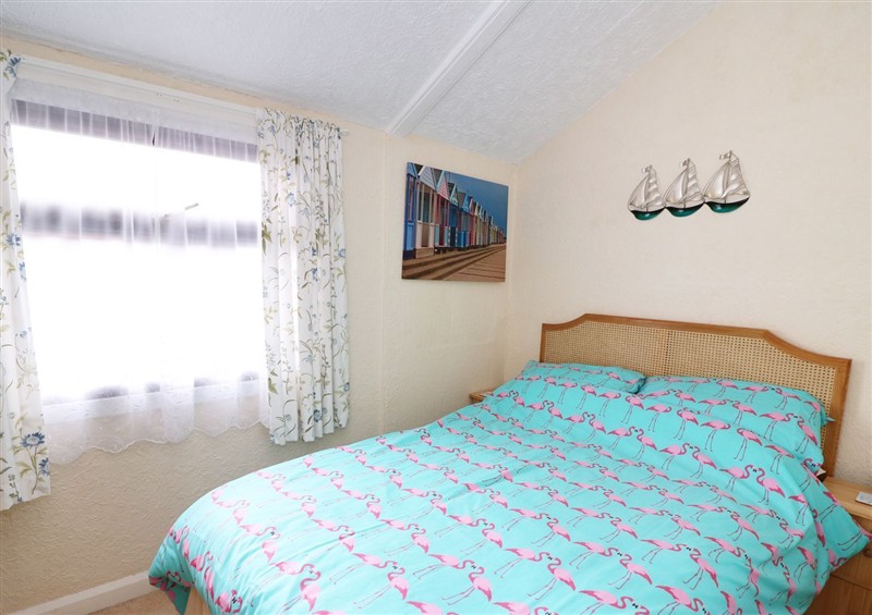 A bedroom in Captain's Cabin (photo 2) at Captains Cabin, Clarach Bay near Aberystwyth