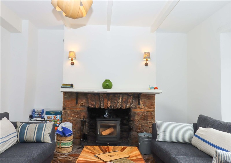 Relax in the living area at Captains Cottage, Brixham