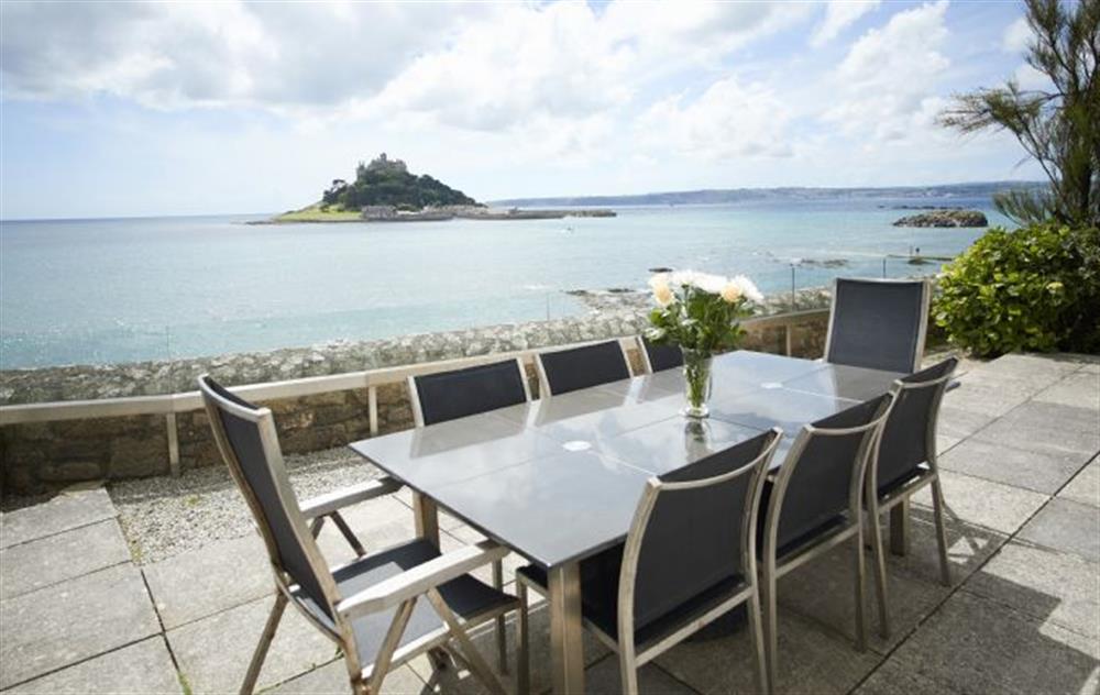 Enjoy alfresco dining whilst entertaining and relaxing with this exquisite view at Captains House, Marazion