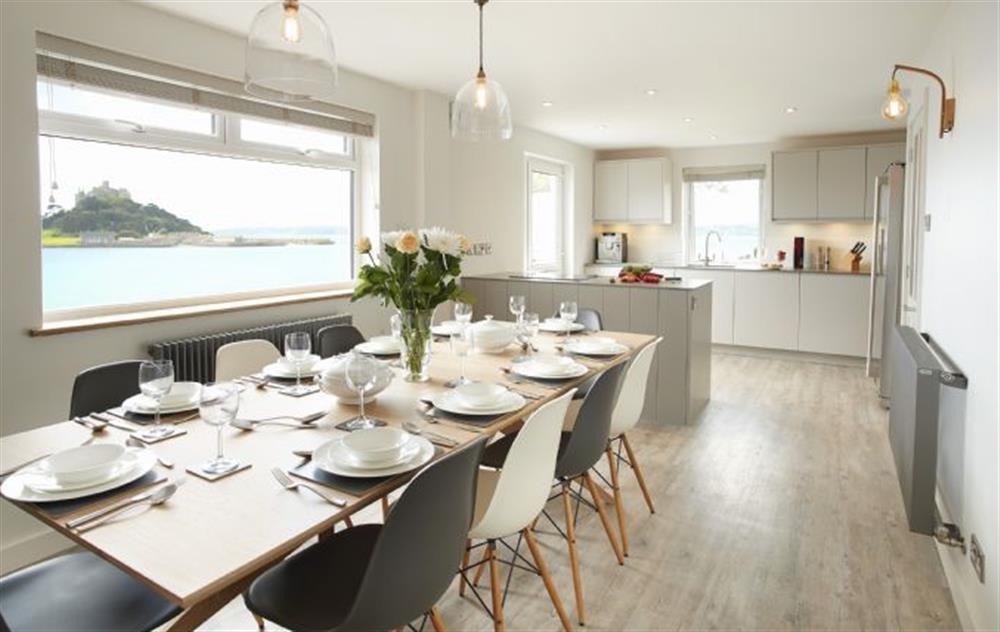 Renovated to a high standard with Scandinavian style furniture high end lighting and wooden floors with a spacious and light dining room for entertaining whilst looking out over the view of St Michael’s Mount