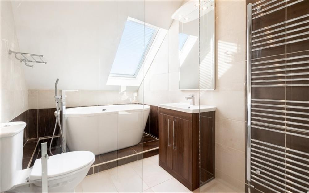 The fabulous bathroom complete with freestanding bath.  (photo 2) at Captain's Lookout in Kingsbridge