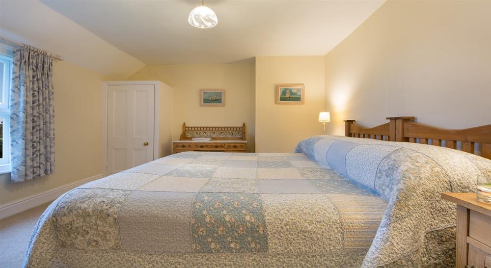 The double bedroom at Caragloose Farm House in Truro, Cornwall