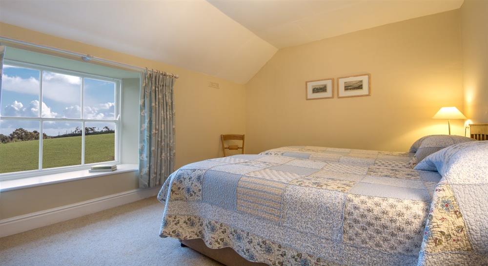 The first twin bedroom at Caragloose Farm House in Truro, Cornwall