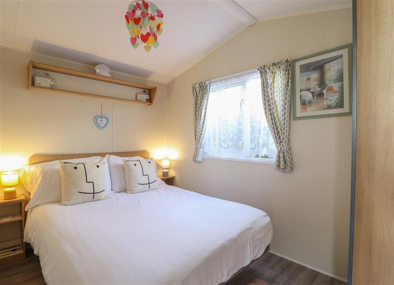 This is a bedroom at Caravan B20, Llanaber near Barmouth
