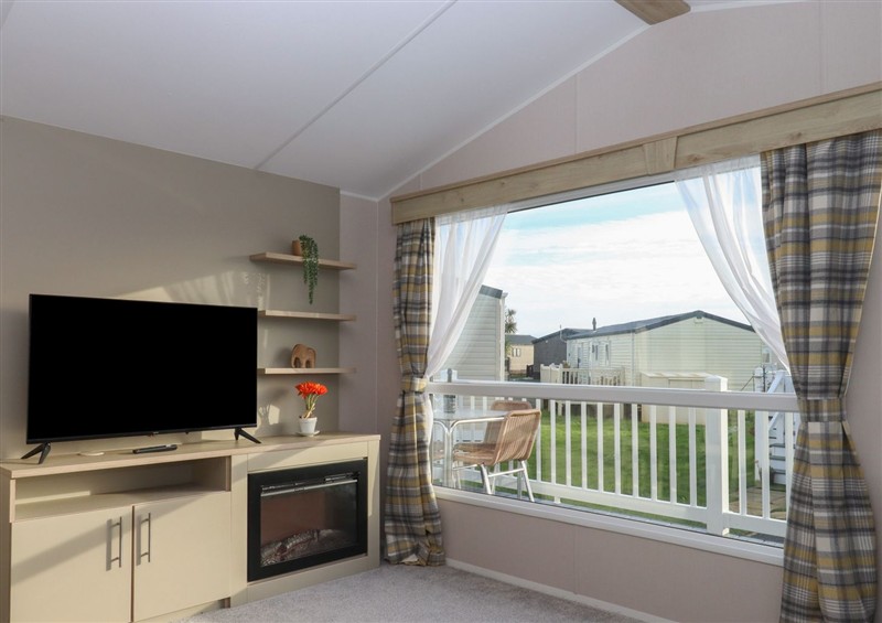 The living room at Caravan B61 at Landscove Holiday Park, Brixham